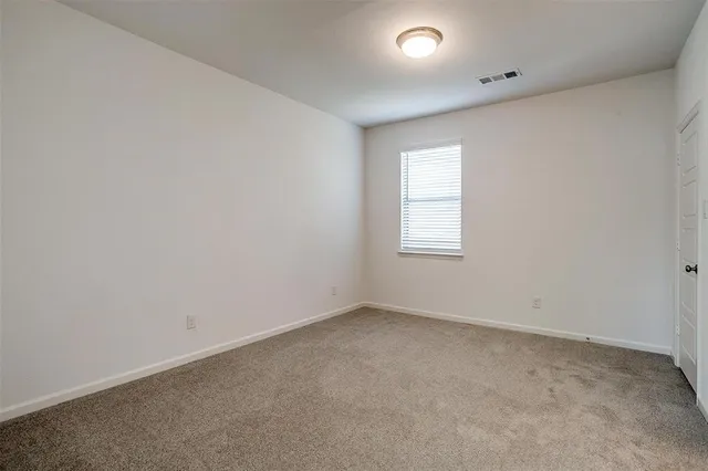a bathroom with a bath tub sink mirror and a shower