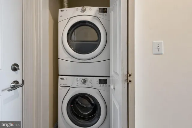 a view of a hallway with windows