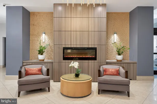 a view of hallway with wooden floor