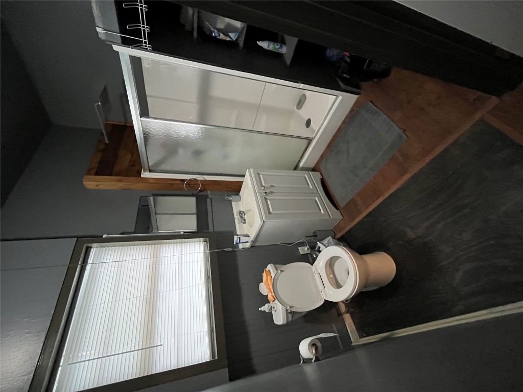 2511 East Cesar Chavez Street Austin, TX 78702 - Photo 16 of 21 a bathroom with a sink and a mirror