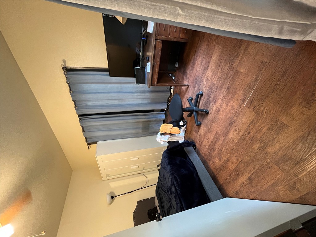 2511 East Cesar Chavez Street Austin, TX 78702 - Photo 17 of 21 a living room with furniture and a flat screen tv