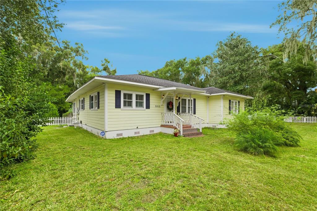 5915 Ave F McIntosh, FL 32664 - Photo 1 of 52 a view of a house with a yard