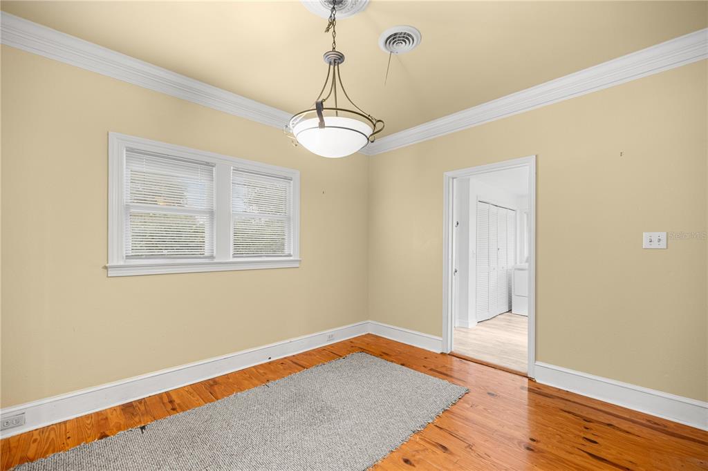5915 Ave F McIntosh, FL 32664 - Photo 14 of 50 a view of empty room with wooden floor and fan