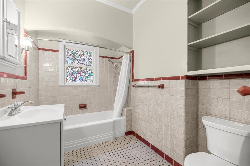5915 Ave F McIntosh, FL 32664 - Photo 17 of 52 a bathroom with a sink toilet and shower
