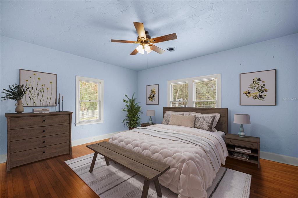 5915 Ave F McIntosh, FL 32664 - Photo 19 of 52 a bedroom with a bed and a dresser