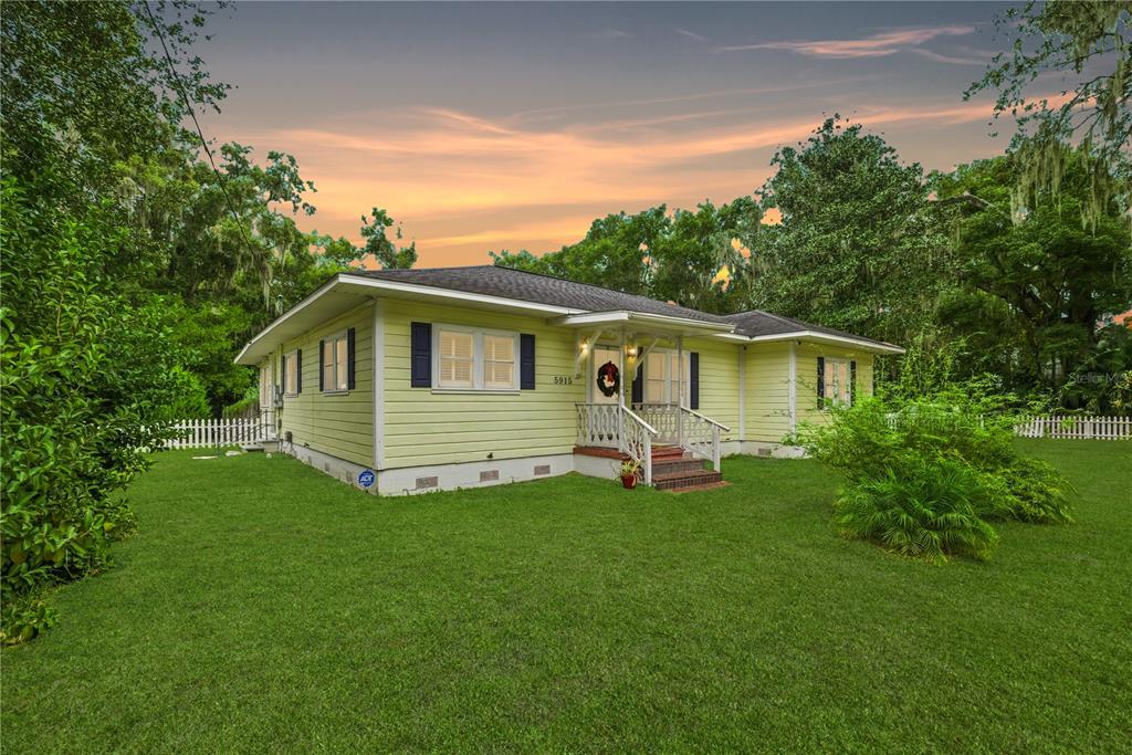 5915 Ave F McIntosh, FL 32664 - Photo 2 of 52 a front view of house with yard and green space