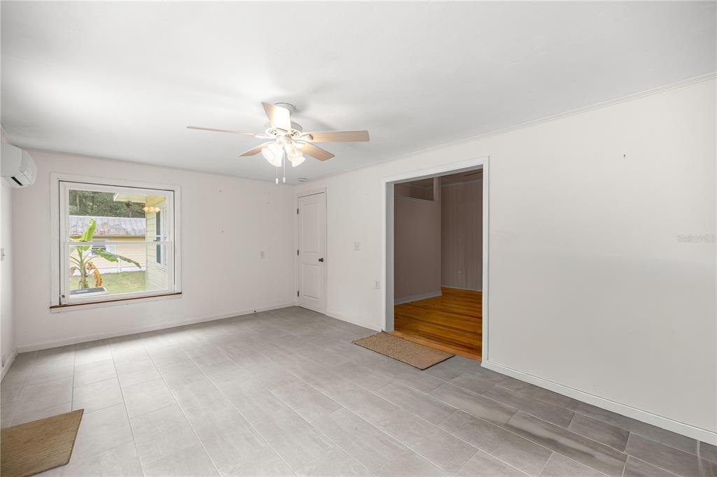 5915 Ave F McIntosh, FL 32664 - Photo 28 of 52 a view of an empty room with a window