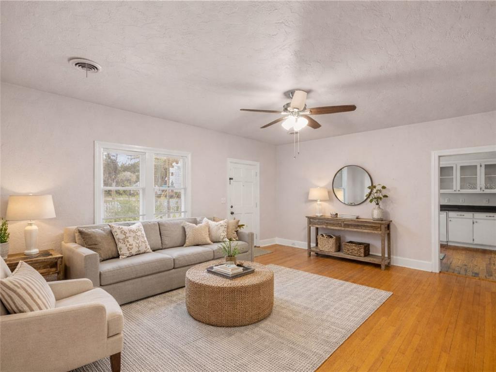5915 Ave F McIntosh, FL 32664 - Photo 3 of 52 a living room with furniture and a wooden floor