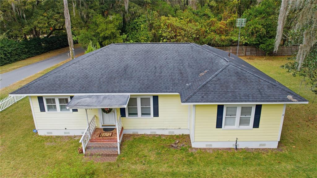 5915 Ave F McIntosh, FL 32664 - Photo 42 of 52 a aerial view of a house with swimming pool next to a yard