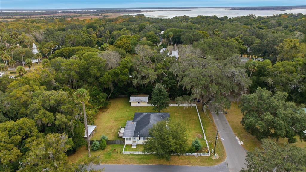 5915 Ave F McIntosh, FL 32664 - Photo 45 of 50 an aerial view of a residential houses with trees