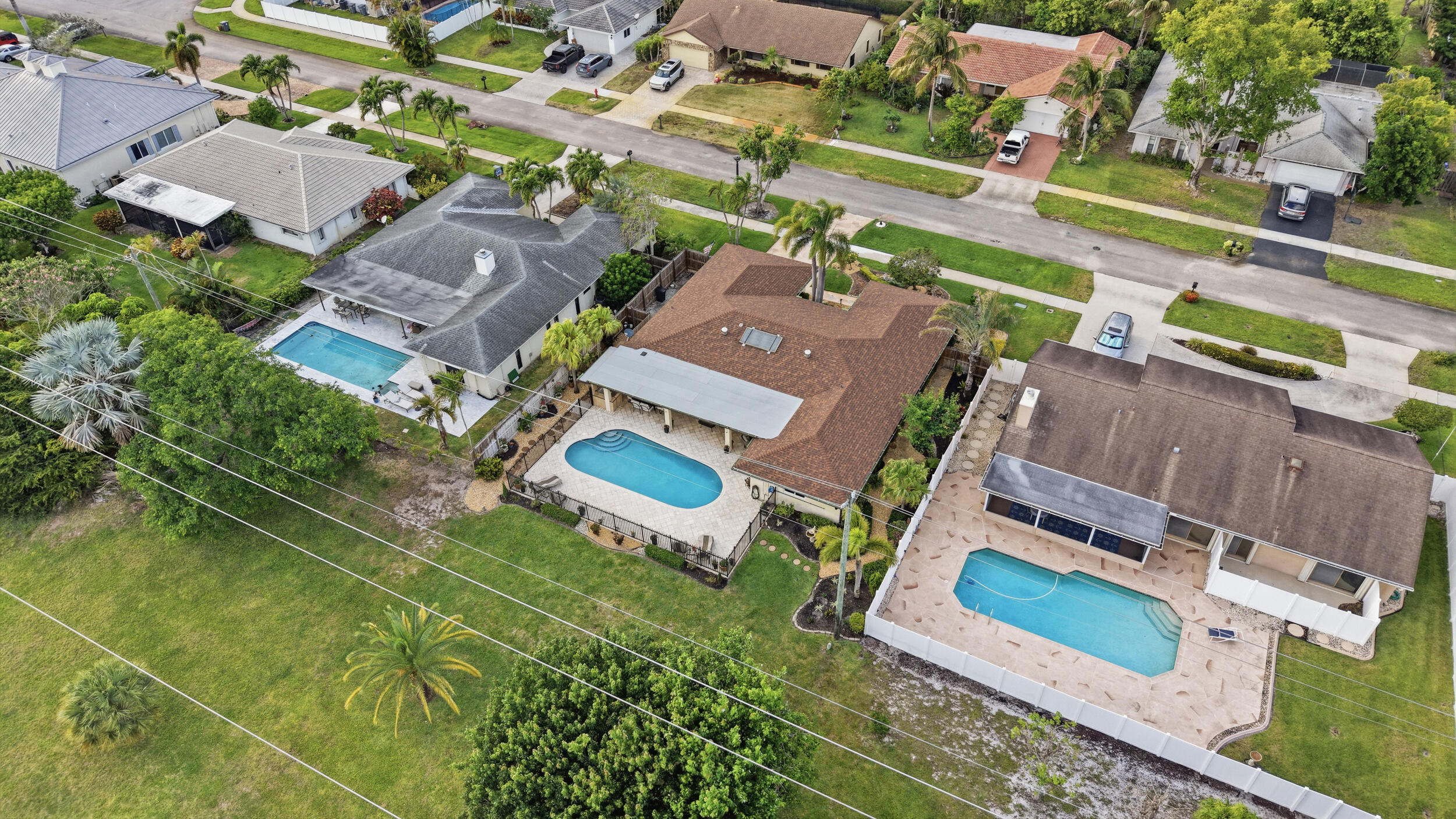 4780 Brandywine Drive Boca Raton, FL 33487 - Photo 43 of 43 an aerial view of residential house with outdoor space and street view