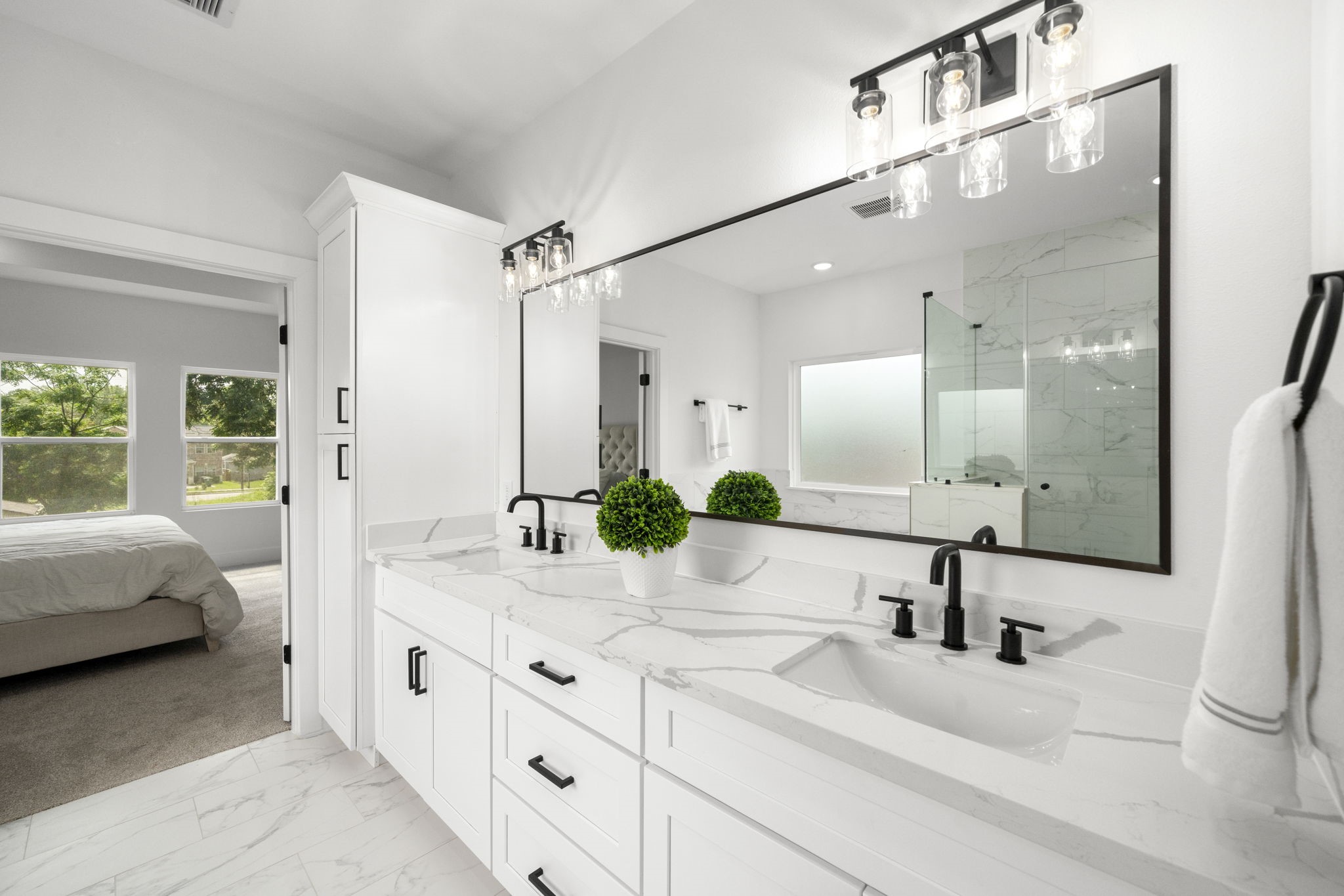 5514 Hardy Street Houston, TX 77009 - Photo 17 of 30 a bathroom with double vanity sink and a mirror