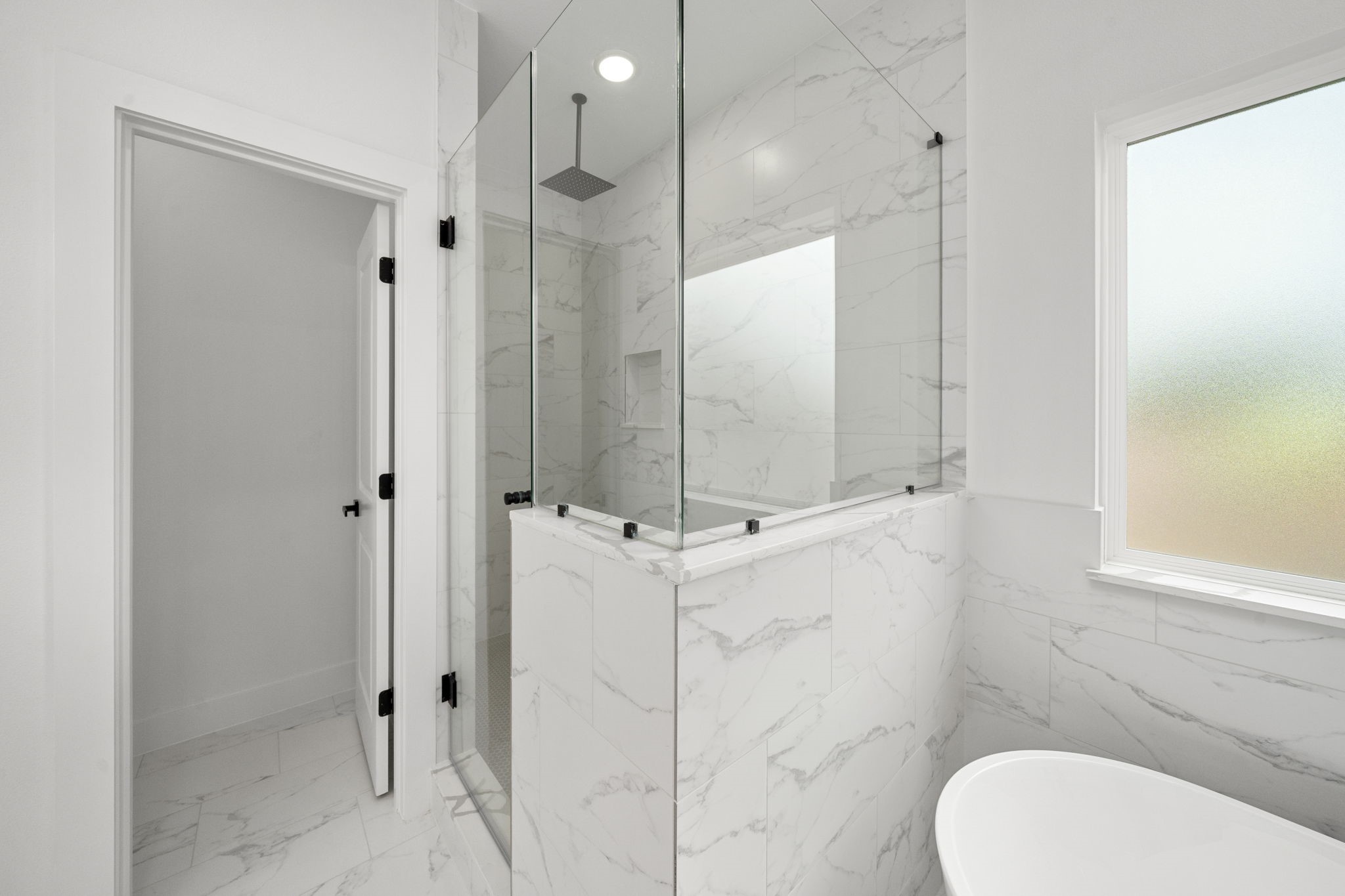 5514 Hardy Street Houston, TX 77009 - Photo 20 of 30 a bathroom with a shower and toilet