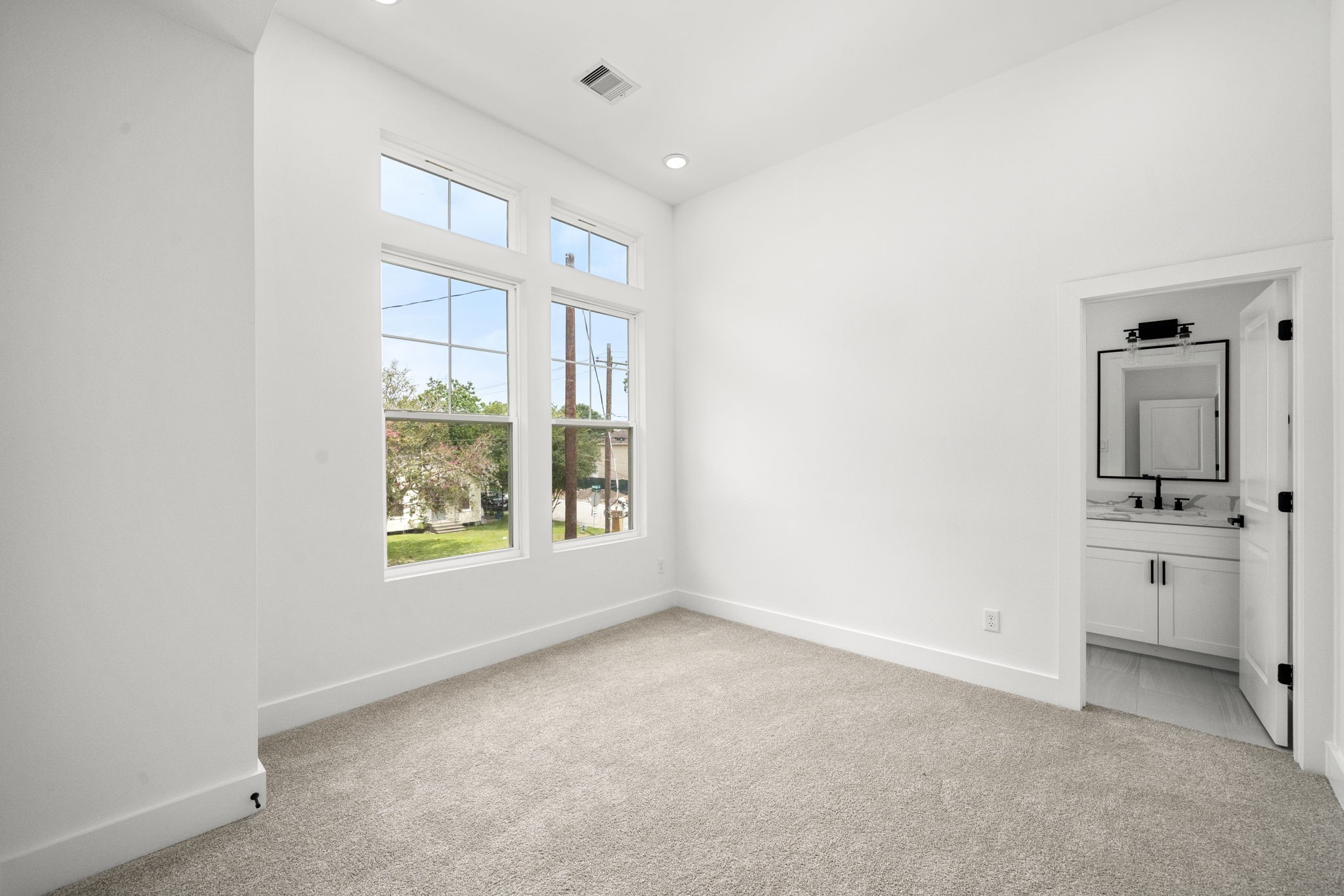 5514 Hardy Street Houston, TX 77009 - Photo 23 of 30 a view of an empty room with a window