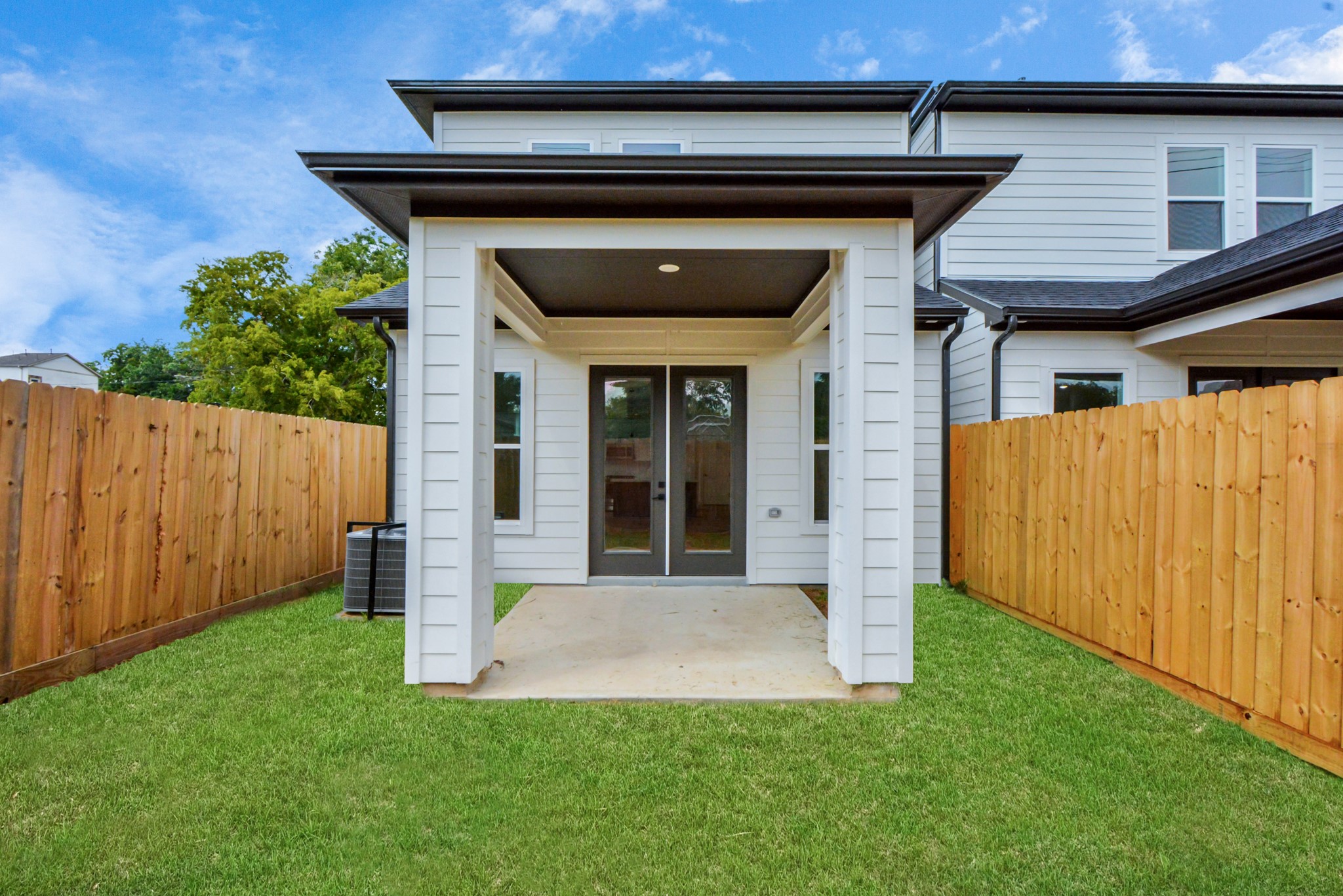 5514 Hardy Street Houston, TX 77009 - Photo 28 of 30 a front view of a house with a yard
