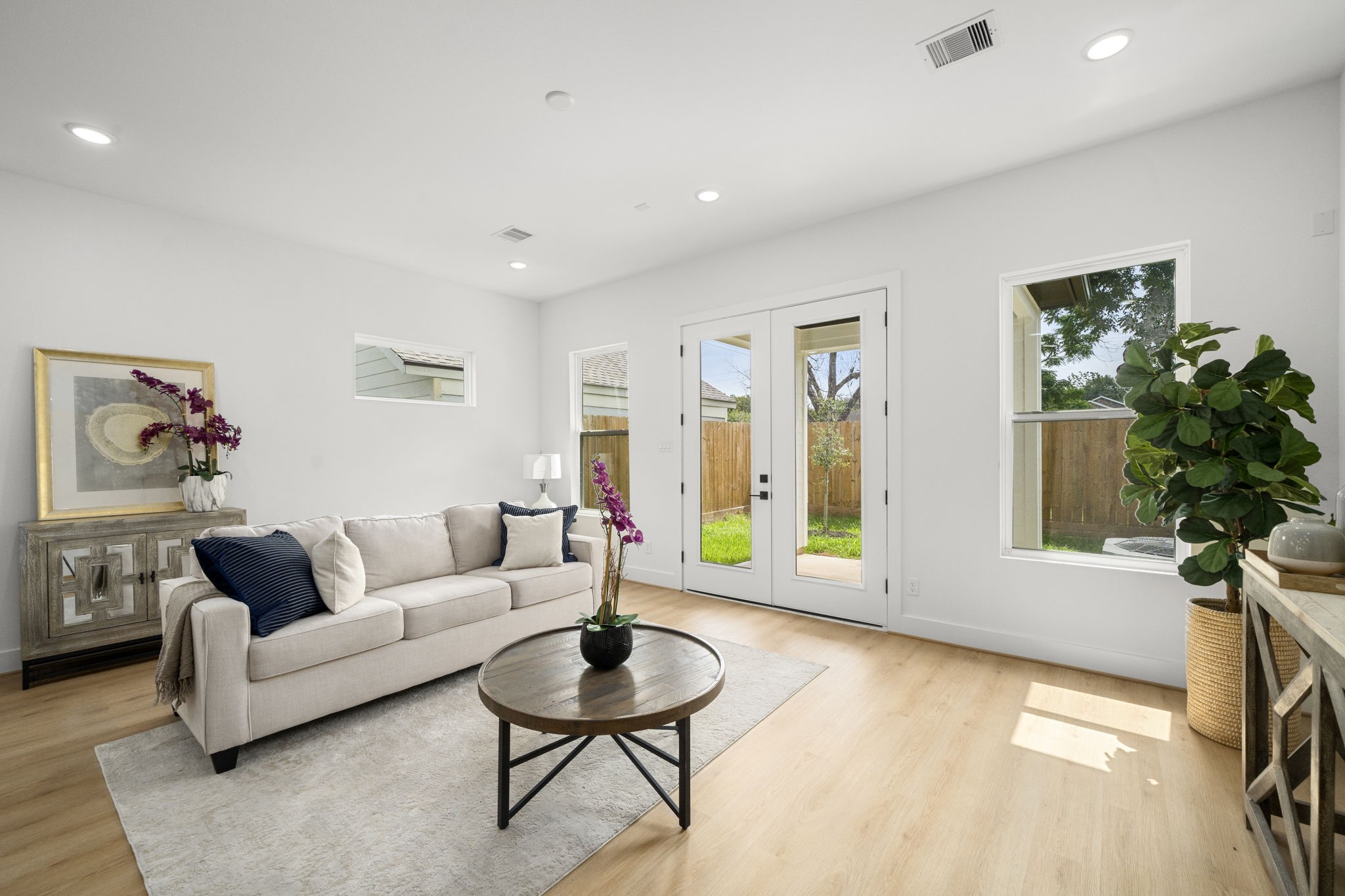 5514 Hardy Street Houston, TX 77009 - Photo 6 of 30 a living room with furniture and a potted plant