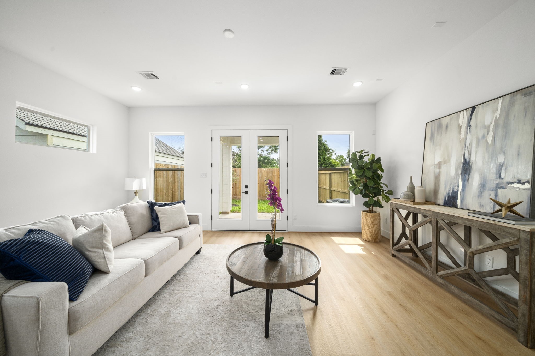 5514 Hardy Street Houston, TX 77009 - Photo 7 of 30 a living room with furniture and a wooden floor