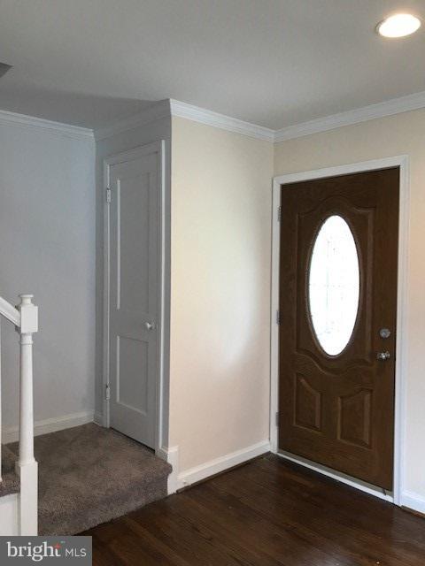 4537 Marble Hall Road Baltimore, MD 21239 - Photo 10 of 14 a view of a livingroom with wooden floor and white walls