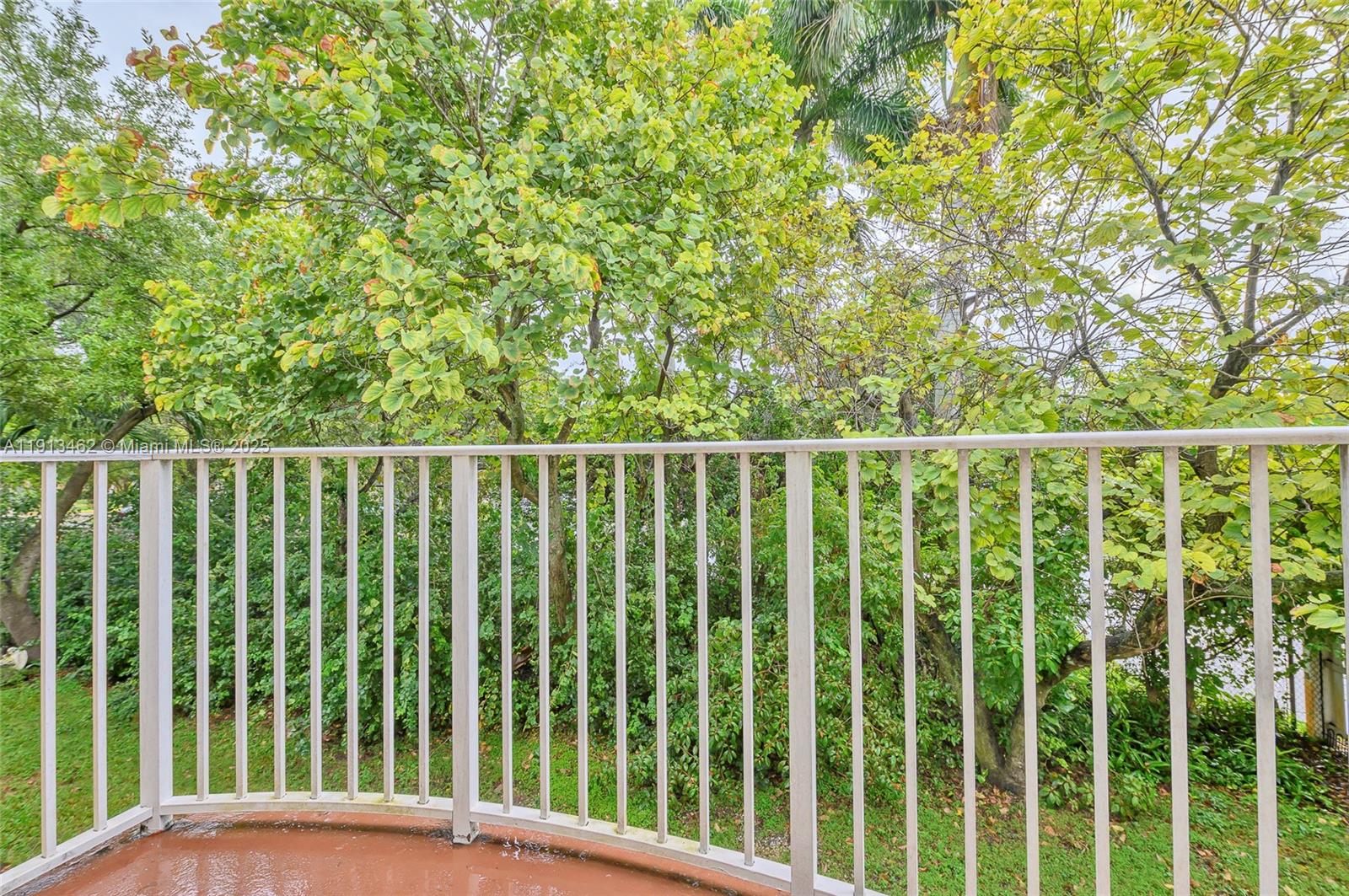 3197 Southwest 128th Way, Unit 135 Miramar, FL 33027 - Photo 22 of 35 a view of a wooden fence