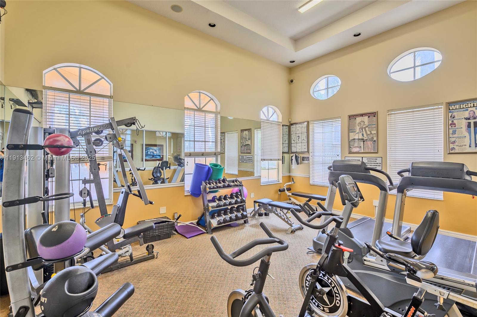 3197 Southwest 128th Way, Unit 135 Miramar, FL 33027 - Photo 28 of 35 a view of a room with gym equipment