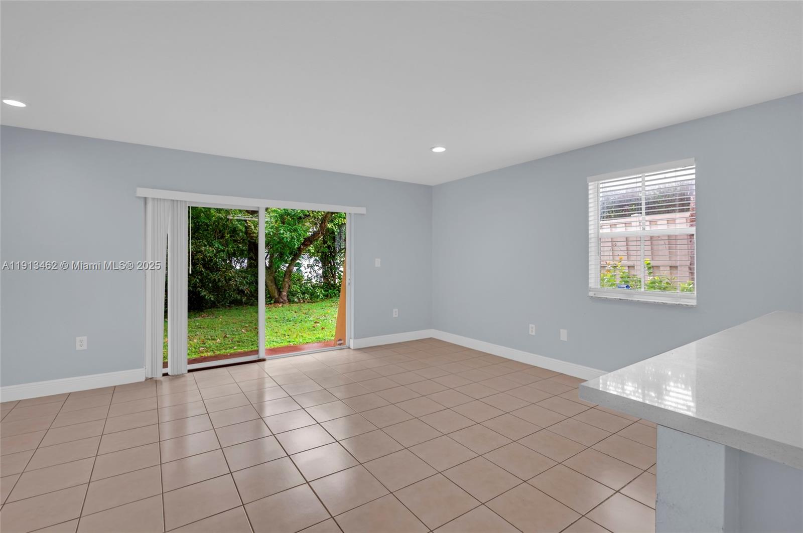 3197 Southwest 128th Way, Unit 135 Miramar, FL 33027 - Photo 32 of 35 a view of an empty room with window