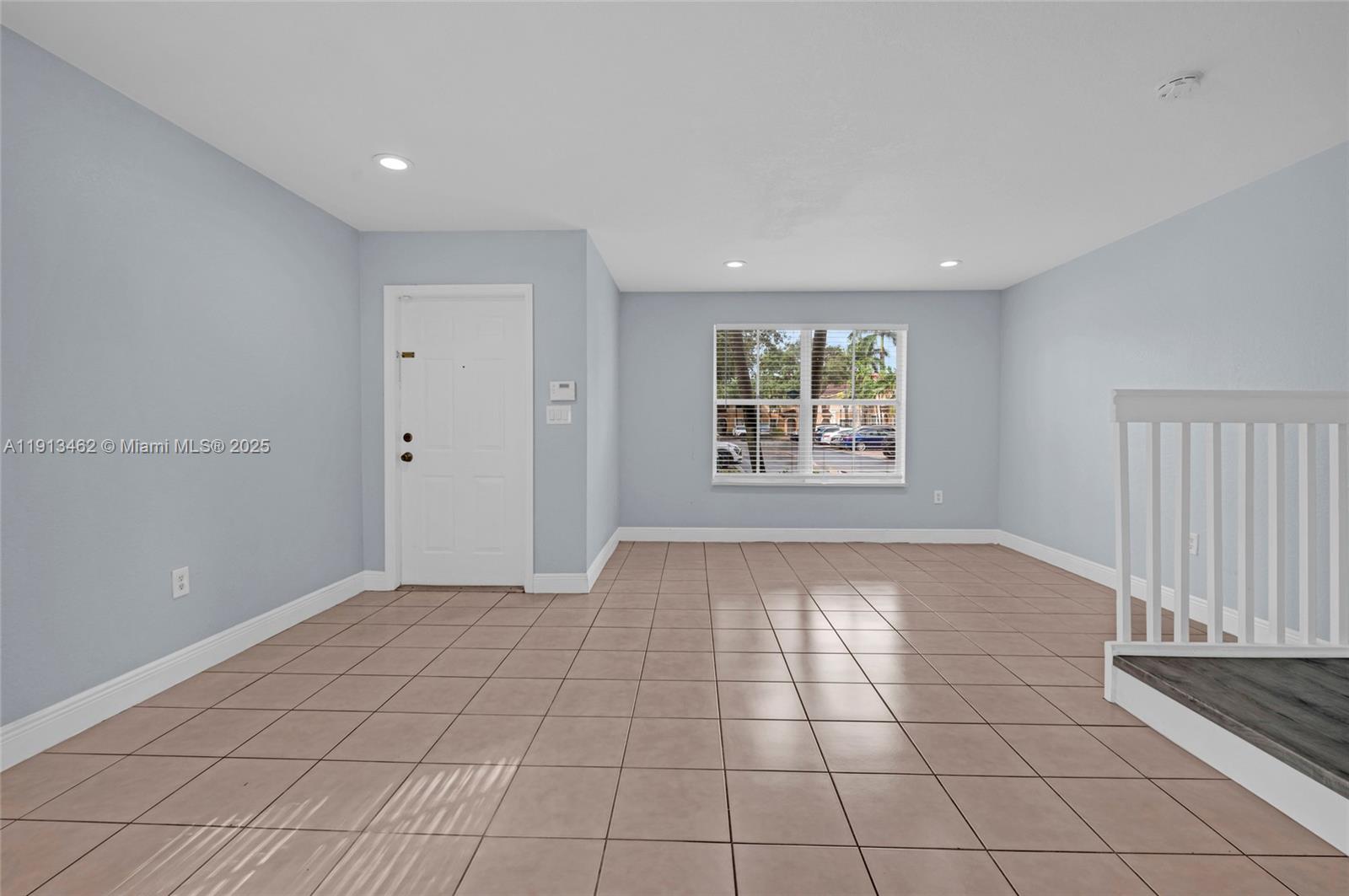 3197 Southwest 128th Way, Unit 135 Miramar, FL 33027 - Photo 34 of 35 a view of an empty room and window