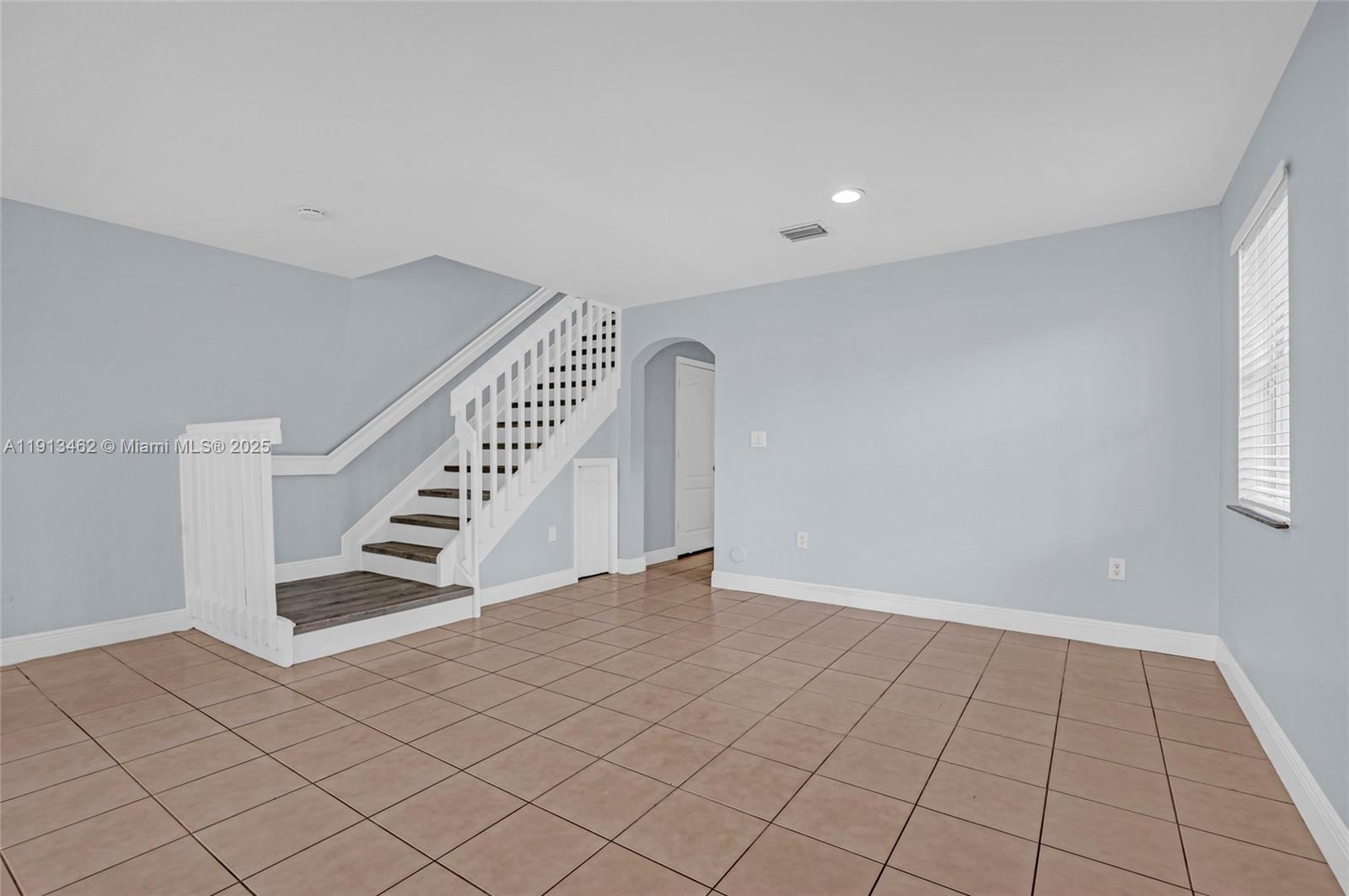 3197 Southwest 128th Way, Unit 135 Miramar, FL 33027 - Photo 8 of 35 a view of an entryway with stairs