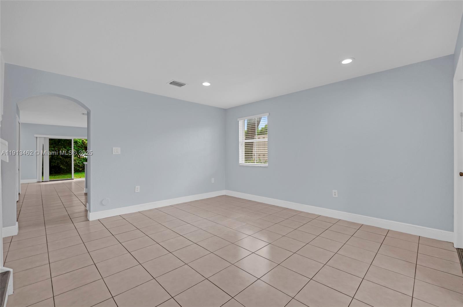 3197 Southwest 128th Way, Unit 135 Miramar, FL 33027 - Photo 9 of 35 a view of an empty room and window