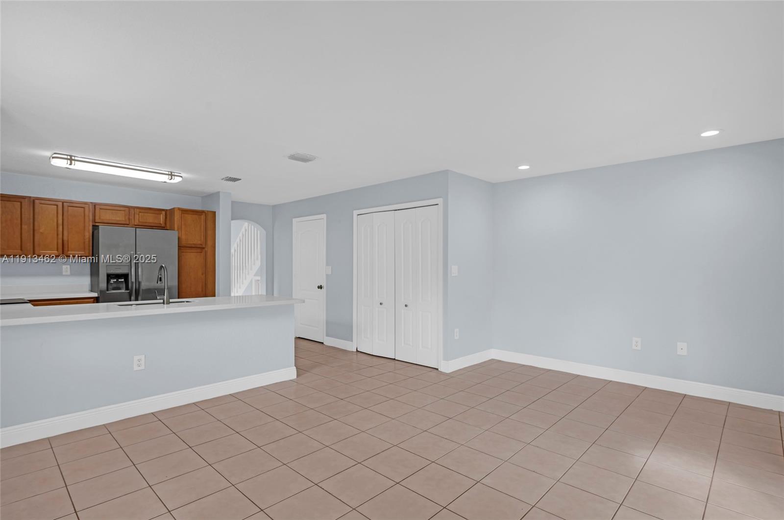 3197 Southwest 128th Way, Unit 135 Miramar, FL 33027 - Photo 10 of 35 a view of kitchen and a window in a room