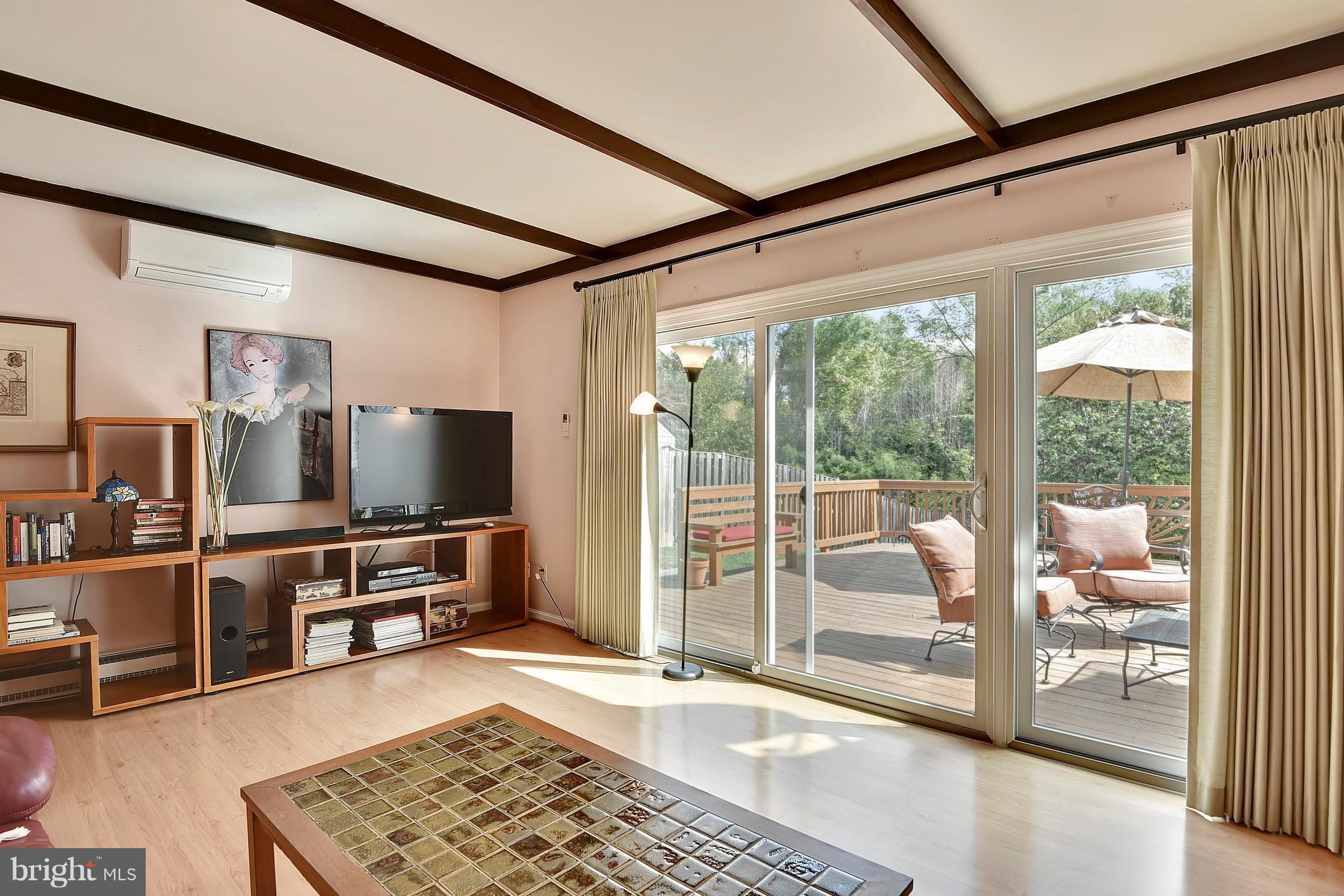 9 Treworthy Road Gaithersburg, MD 20878 - Photo 14 of 30 Family Room w/ glass sliders to huge deck