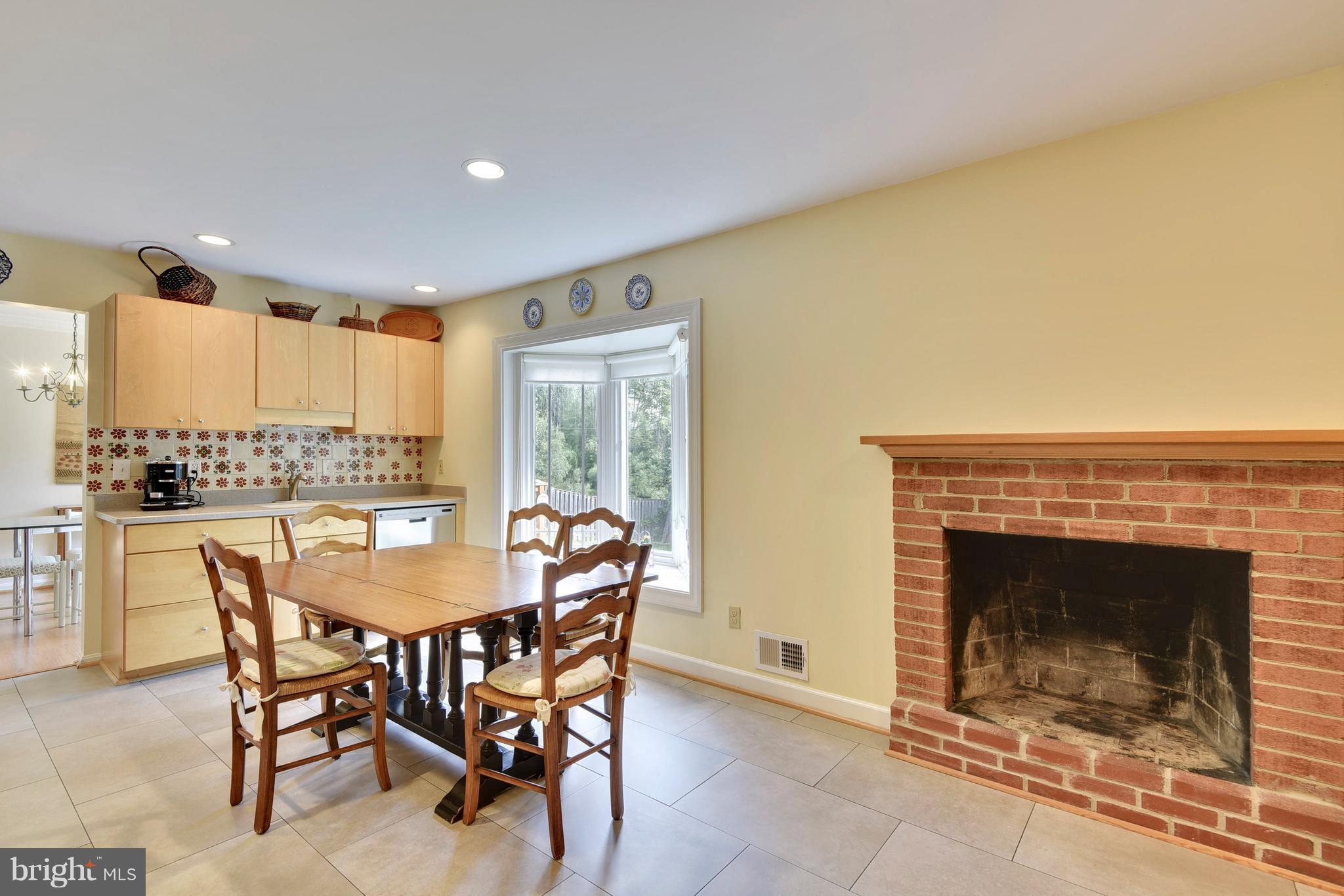 Kitchen w/ fireplace to bring everyone together