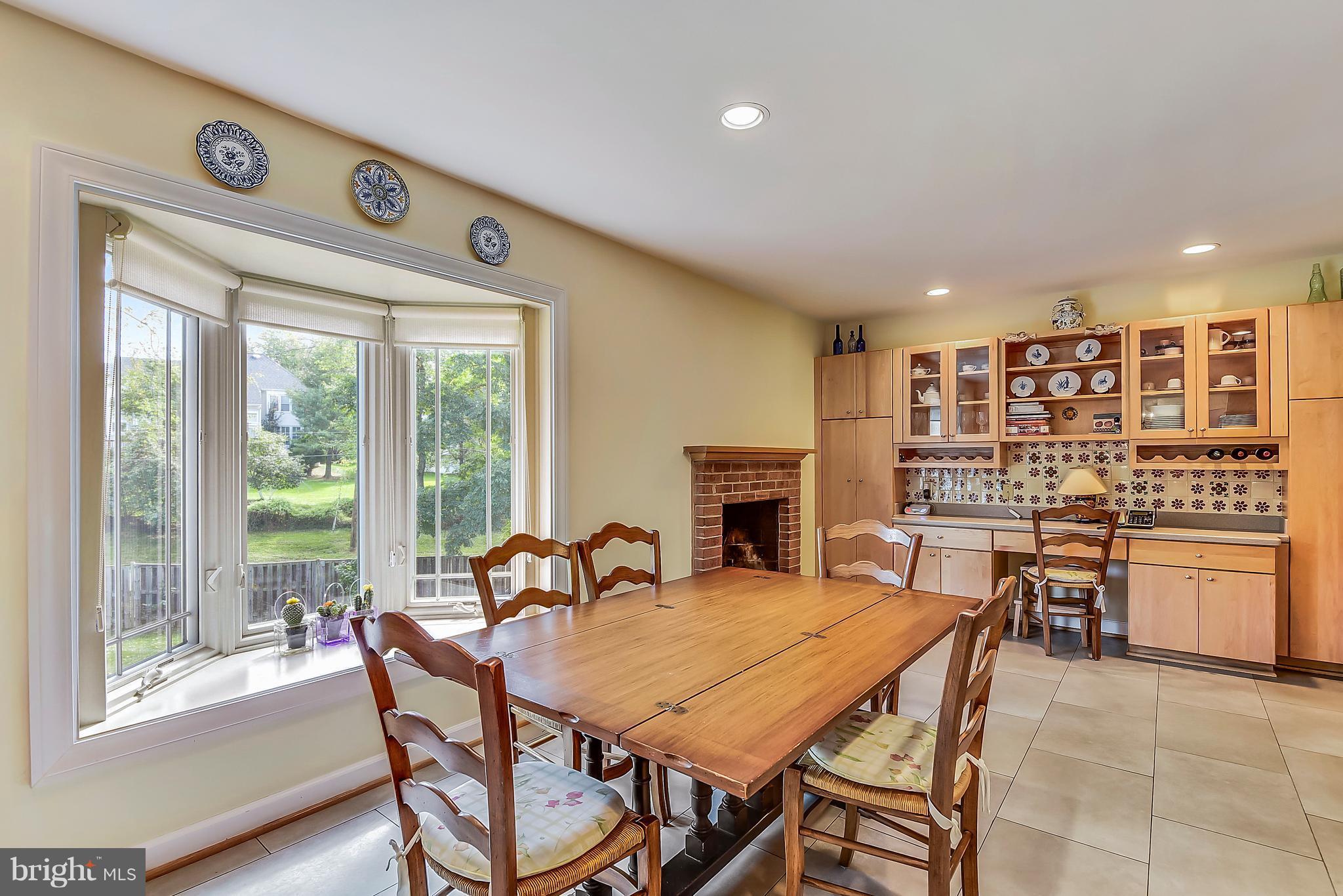 Plenty of cabinets, eat-in kitchen table/island