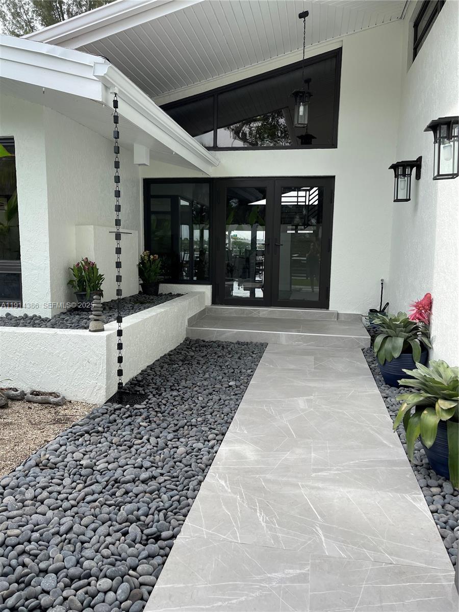 7521 Southwest 56th Street Miami, FL 33155 - Photo 33 of 34 a view of a entryway door front of house