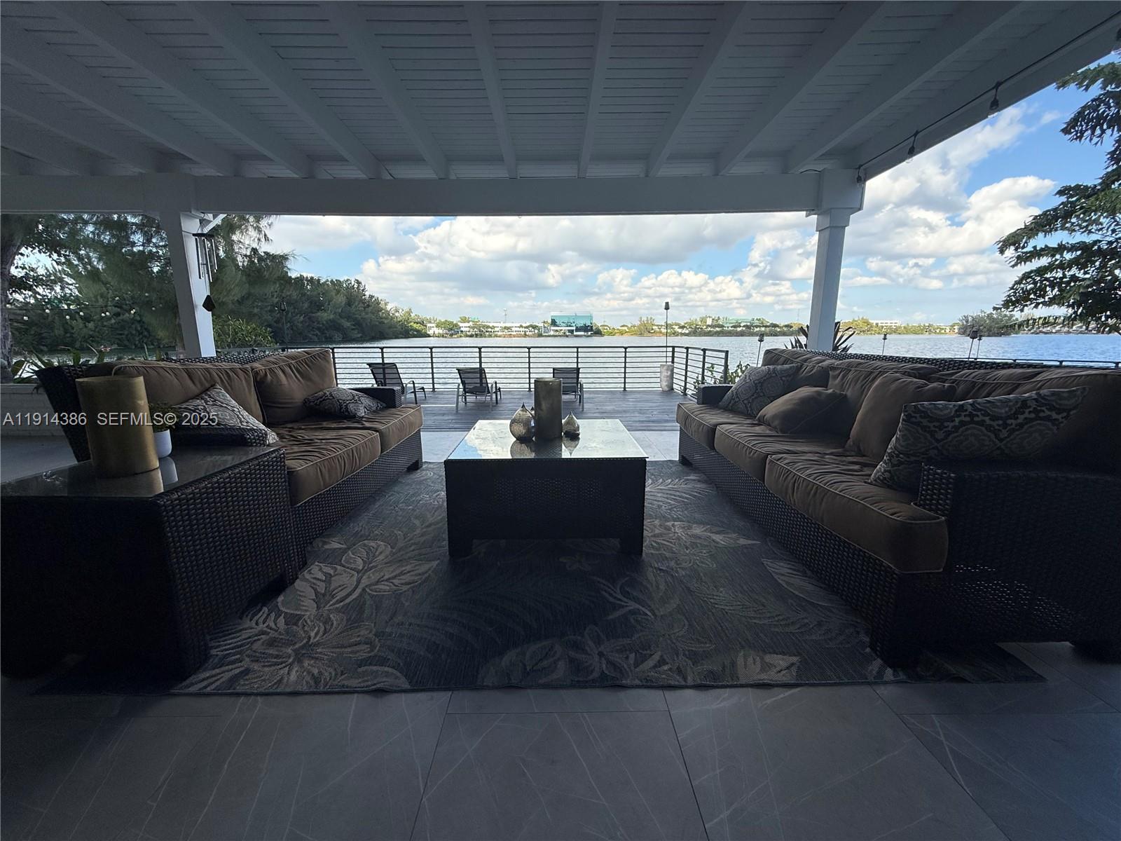7521 Southwest 56th Street Miami, FL 33155 - Photo 4 of 34 a view of a couches in the roof deck