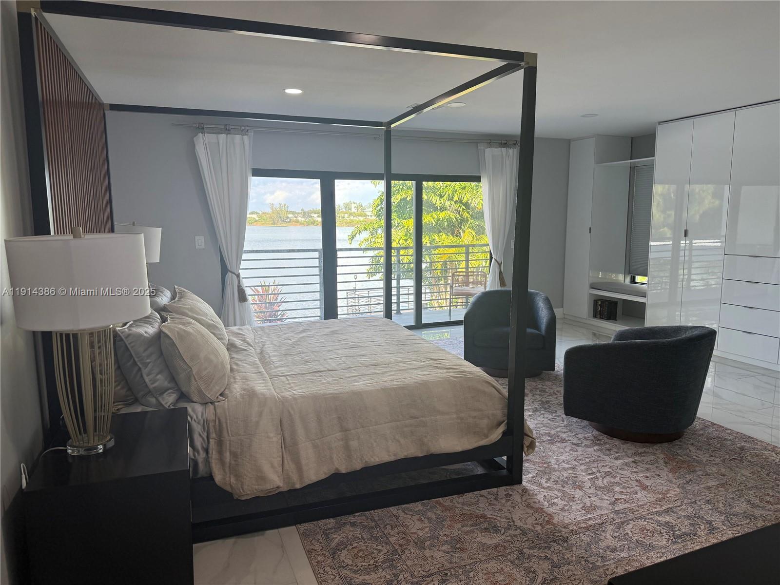 7521 Southwest 56th Street Miami, FL 33155 - Photo 9 of 34 a bedroom with a bed and a couch