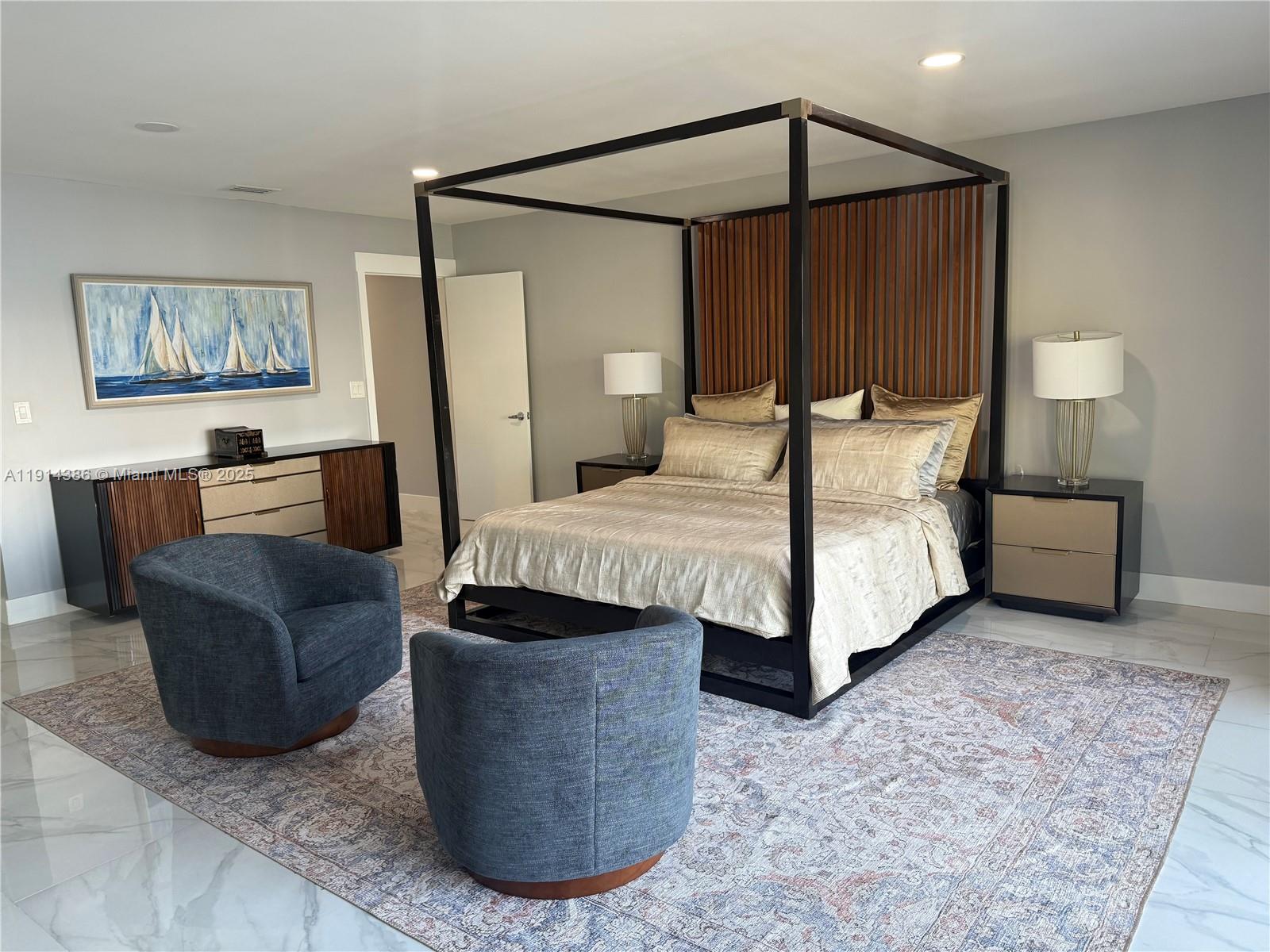 7521 Southwest 56th Street Miami, FL 33155 - Photo 10 of 34 a bedroom with a bed and a couch