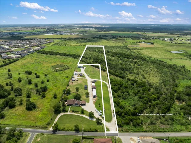 a view of a swimming pool with an outdoor space and seating area
