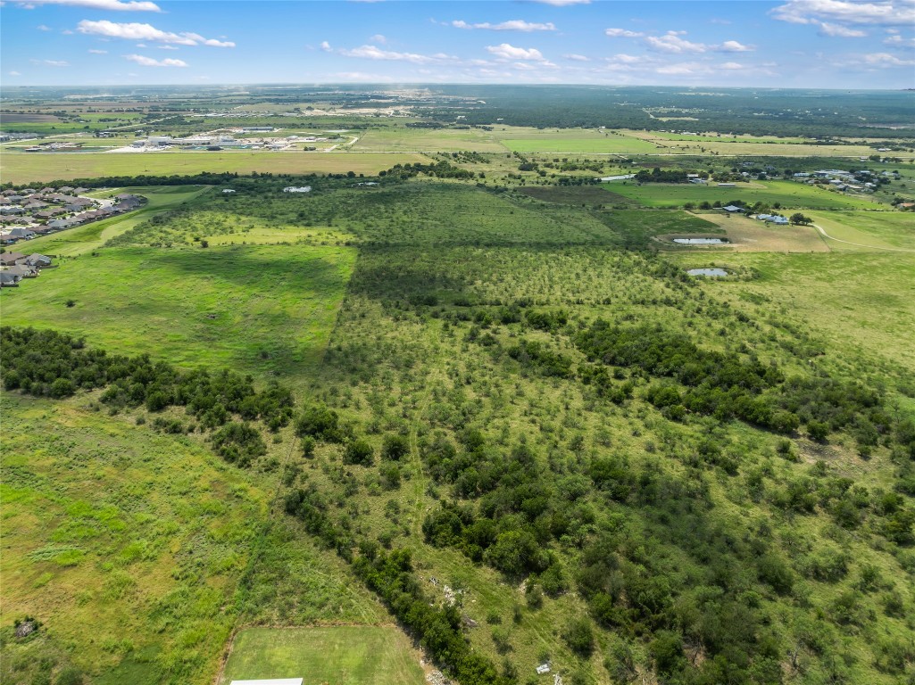 925 1st Street Jarrell, TX 76537 - Photo 6 of 7 a view of an ocean and a yard