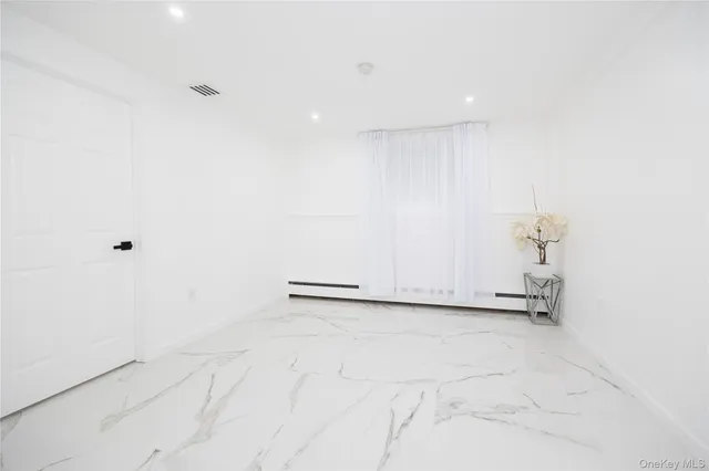 an empty room with a natural light