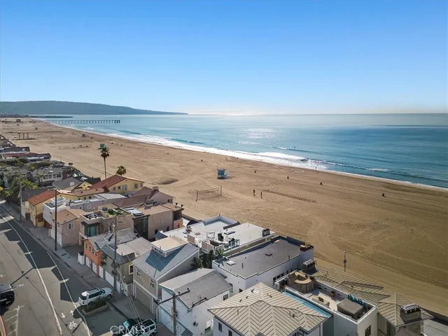 an aerial view of beach and ocean