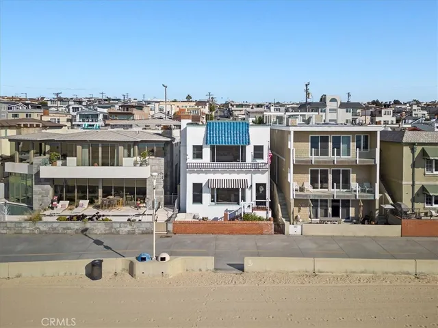 a living room with furniture fireplace and a flat screen tv