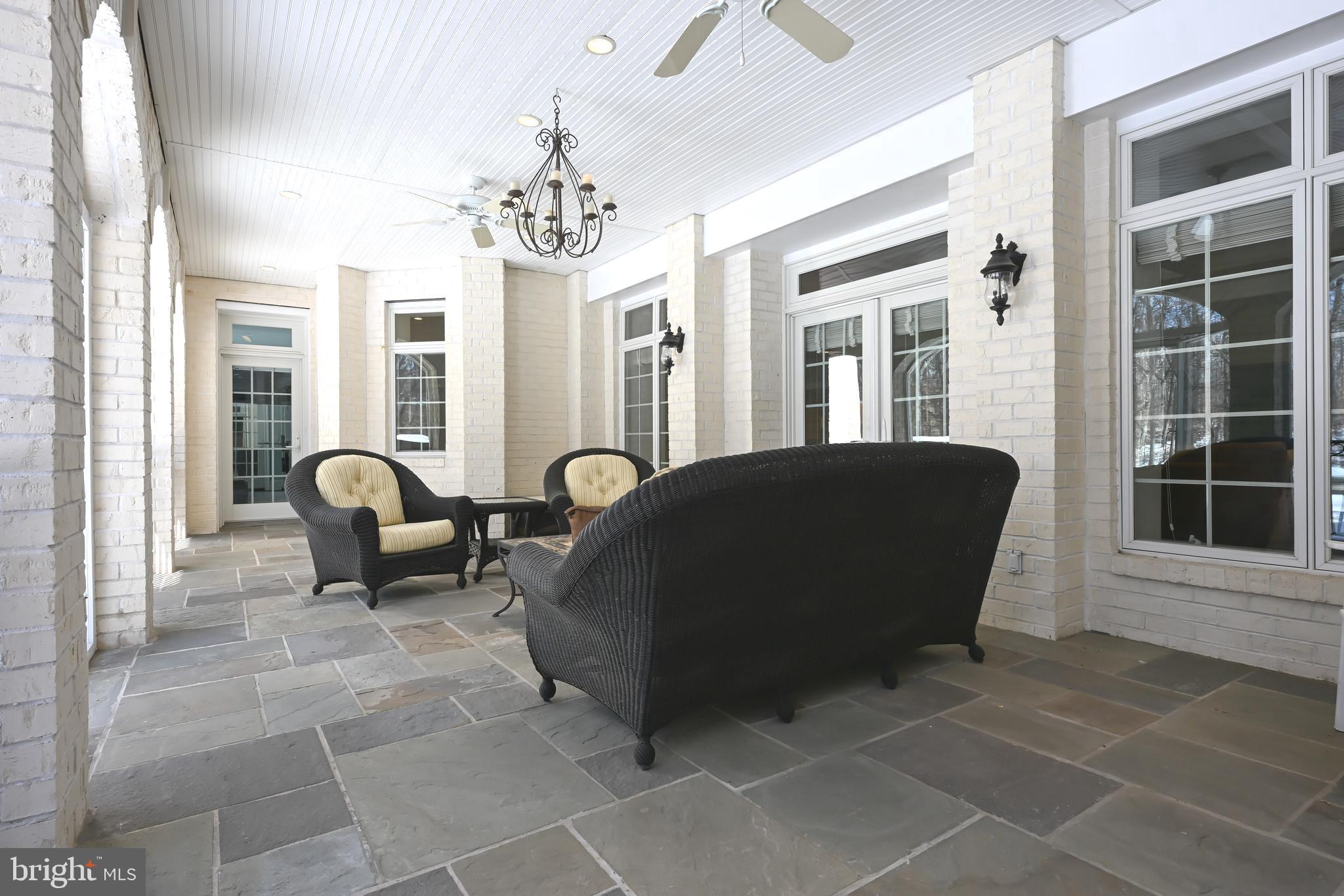 25 Gassaway Lane Edgewater, MD 21037 - Photo 89 of 125 Screened Porch with Flagstone Floors