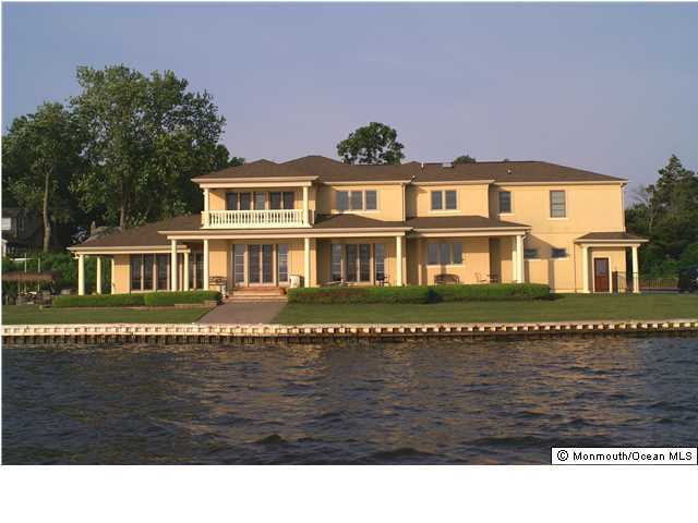 16 Dock Road Brick, NJ 08723 - Photo 1 of 3 a black and white photo of a house