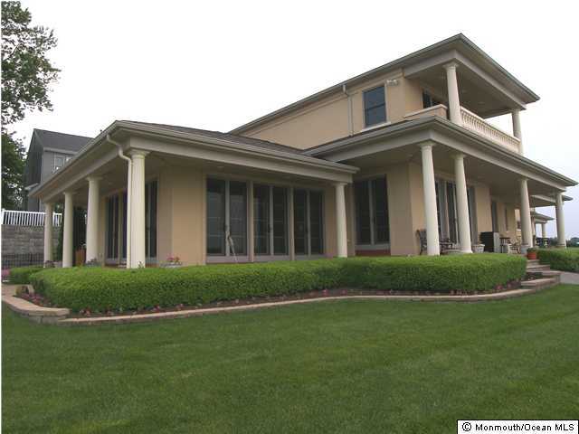 16 Dock Road Brick, NJ 08723 - Photo 3 of 3 a front view of a house with a garden