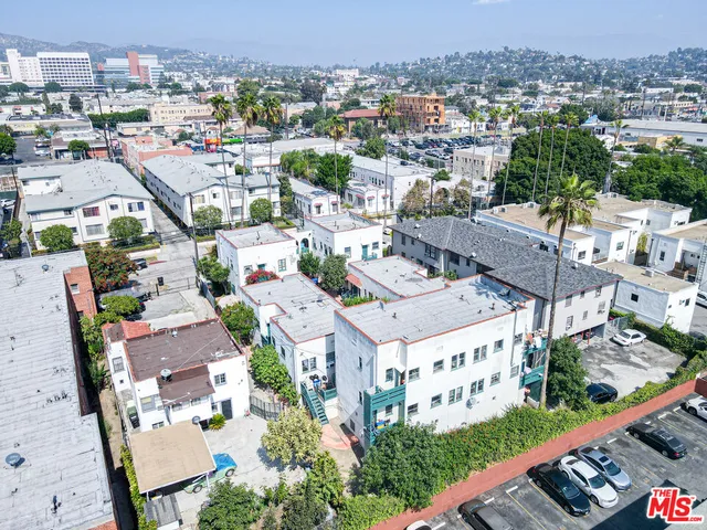 an aerial view of a house with a garden