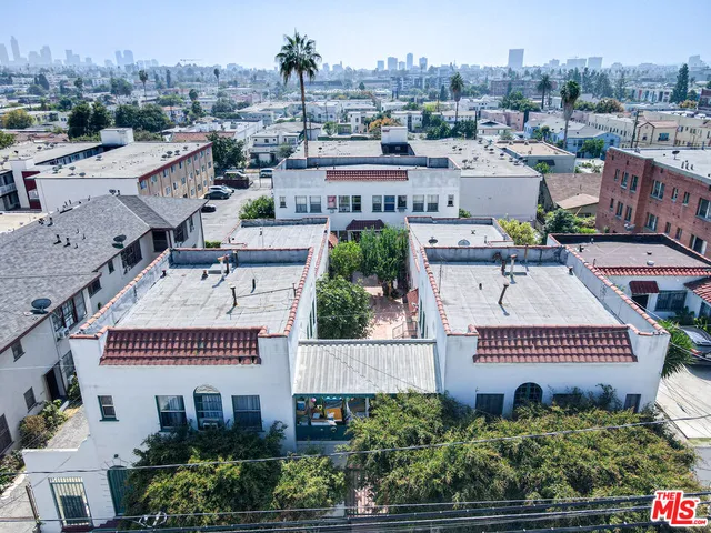 an aerial view of a house with a garden