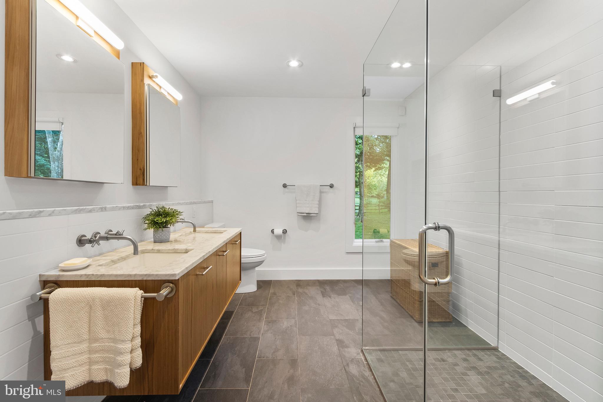 1260 Lakemont Road Villanova, PA 19085 - Photo 25 of 44 Main floor bathroom with roll-in shower