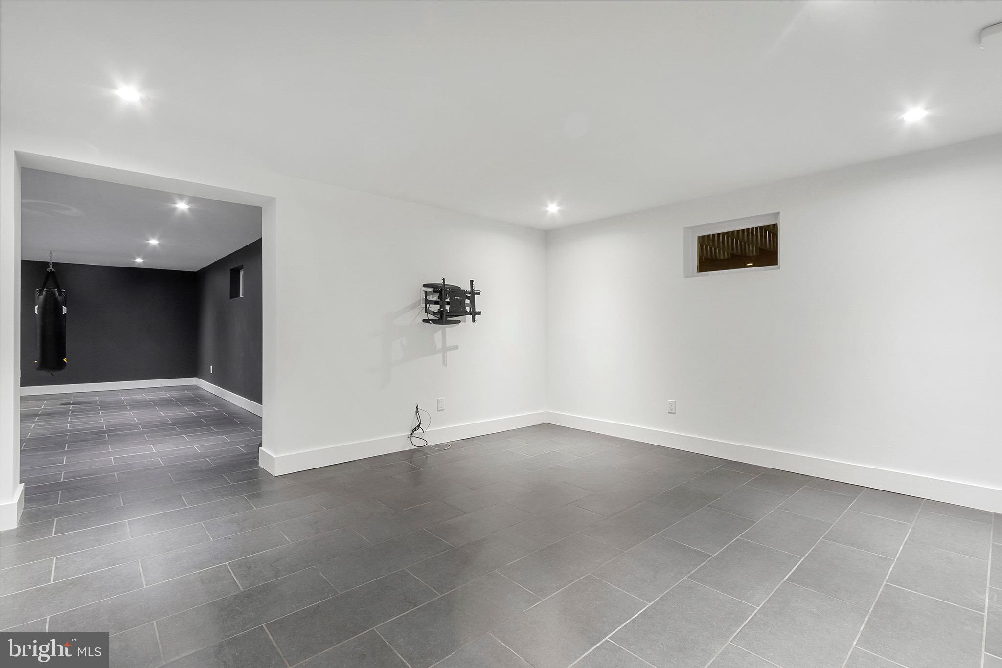 1260 Lakemont Road Villanova, PA 19085 - Photo 36 of 44 Finished basement with slate flooring