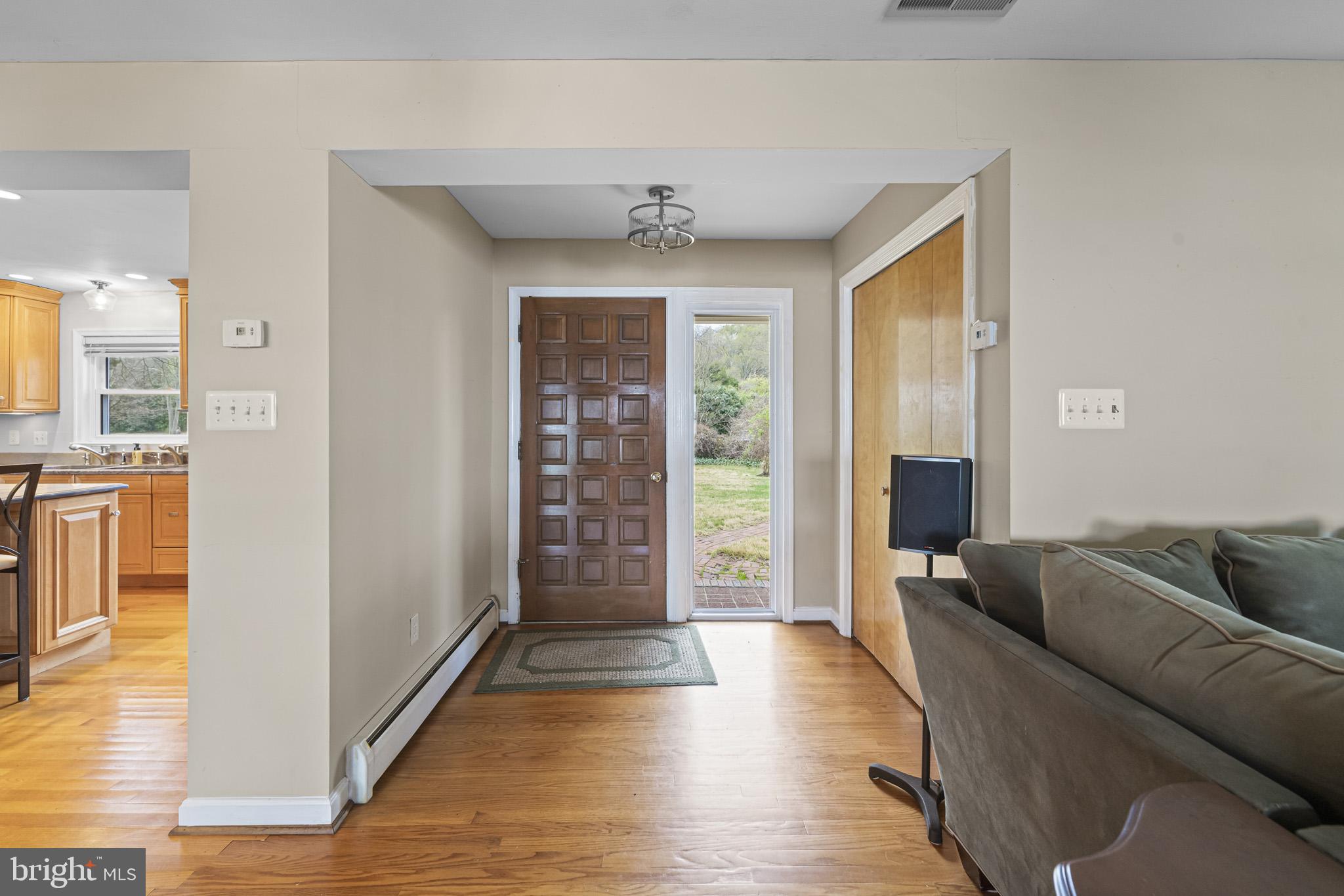 14078 River Road Newburg, MD 20664 - Photo 7 of 58 Foyer/entryway with gleaming hardwood floors