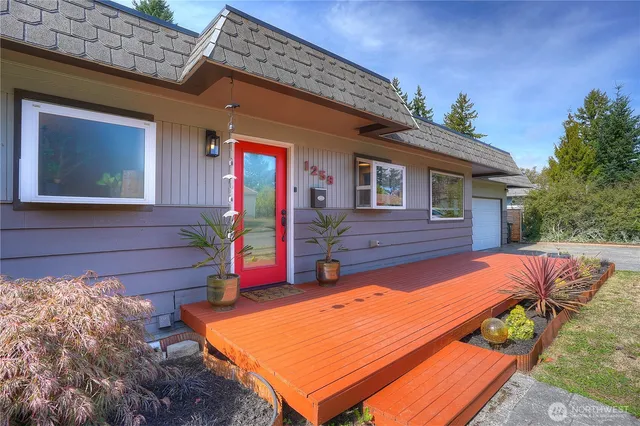 a backyard of a house with seating space